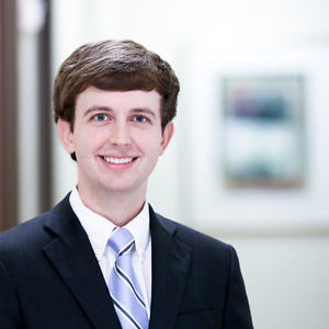 Andersen, Tate & Carr, P.C. Attorney Tyler Dillard Helps Coach Grady High School to Mock Trial State Championship